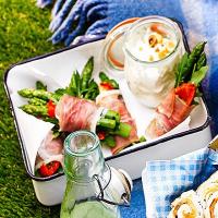 Asparagus & prosciutto bundles with goat's cheese & hazelnut dip image