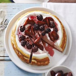 Lemon cheesecake with baked plums & blackberries image