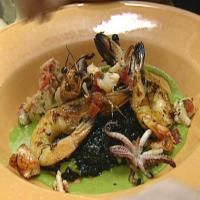 Black Squid Ink Risotto with Grilled Prawns, Lobster and Green Onion Vinaigrette_image