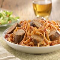 Grilled Sweet Italian Chicken Sausage over Linguine image