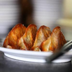 Pretzel Pork and Chive Dumplings With Tahini_image