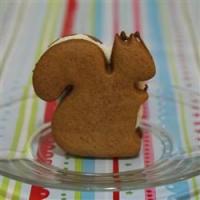 Frosted Molasses Ginger Sandwich Cookies image