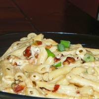 Penne Pasta With Walnuts Green Onions and Goat Cheese image