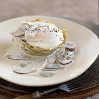 Poached Eggs on Artichoke Bottoms with White Truffle Cream and Mushrooms_image