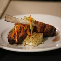 Roasted Rack of Lamb with Rosemary-Pomegranate Sauce and Goat Cheese Potato Cake_image