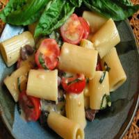 Pasta With Brie, Tomatoes, Olives, and Basil_image