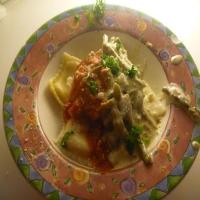 Cheese Ravioli with Alfredo and Asparagus._image