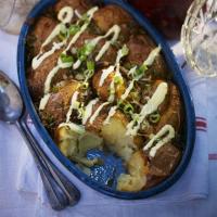 Crispy baked potatoes with spring onions image