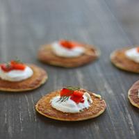 Green Onion Blinis With Red Pepper Relish and Goat Cheese_image