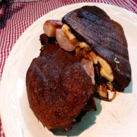 Grilled Sausage Sandwiches With Caramelized Onions and Gruyere C image
