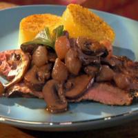 Flank Steak with Merlot Mushrooms and Pearl Onions over Toasted Polenta image