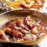Sausages with quick onion gravy & sweet potato chips image