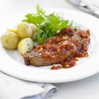Sirloin steaks with pizzaiola sauce image