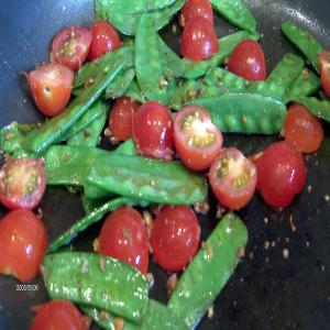 Sugar Snap Peas with Tomatoes and Garlic image