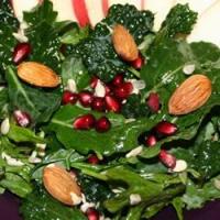 Kale Salad with Pomegranate, Sunflower Seeds and Sliced Almonds_image