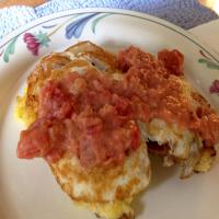 Fried Grit Cakes With Eggs and Tomato Gravy image