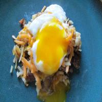Crispy Potatoes over Crumbled Sausage With Poached Egg #5FIX image