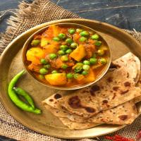 Aloo Matar Sabzi Recipe - Potatoes Peas In Tomato Gravy_image