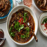 Spicy Noodle Soup With Mushrooms and Herbs image