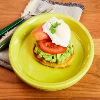 Corn Cakes Topped with Avocado, Tomato, Poached Eggs and Smoked Salmon_image