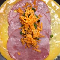 Ham & Cheddar Wrapped Breakfast Burrito Recipe by Tasty_image