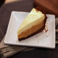 Pumpkin Cream Pie with Gingersnap Crust and Rum Cheesecake Topping image