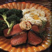 Pan-Seared Rib-Eye Steaks with Goat Cheese, Caper and Sun-Dried Tomato Butter image