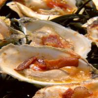 Barbecued Oysters with Bacon and Garlic Butter image