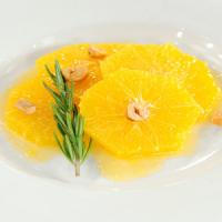 Sliced Oranges with Candied Hazelnuts image