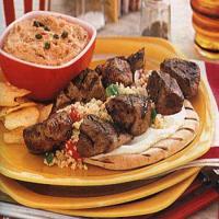 Grilled Cumin-Lamb Pitas with Couscous and Yogurt image