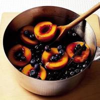 Caramel poached peaches with blueberries image
