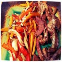 Grilled Venison Heart with Peppers and Onions image