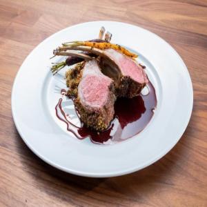 Pistachio Crusted Rack of Lamb with Date Couscous and Baharat Spiced Carrots image