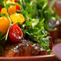 Rosemary-Garlic Steaks with Arugula, Tomatoes and Parmigiano-Reggiano image