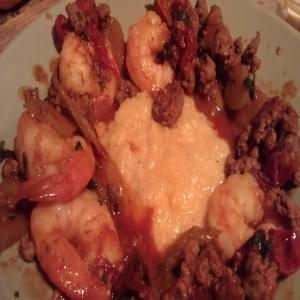 Shrimp and Grits With Roasted Tomato, Fennel, and Sausage image