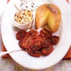 Sheep's Cheeses with Oven-Dried Tomatoes and Toasted Almonds_image