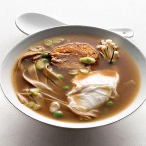 Steamy Bowl of Noodles with Poached Duck Egg, Scallions, and Mushrooms_image