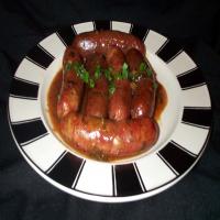 Sausage Cooked in White Wine image