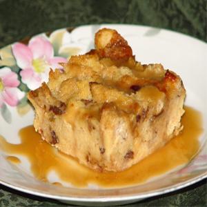 Cranberry and Raisin Bread Pudding With Caramel Sauce image