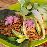 Achiote-Rubbed Pork Baked in Banana Leaves image