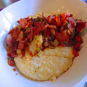 Smothered Grits With Jalapeno Sausage and Bacon image