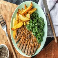 Crushed Peppercorn Steak with Creamed Kale and Potato Wedges_image