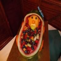 Baby in a bassinet fruit center piece_image