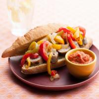 Sunny's Currywurst with Quick-Pickled Peppers and Onions and Sunny's Curry Ketchup image
