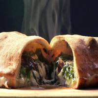 Broccoli Rabe, Olive and Parmesan Calzone image