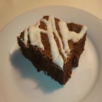 Dark Chocolate Chunk Brownies With Sweet Cream Cheese Drizzle_image