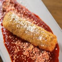 Fried Organic Chicken Tamales with Red Chile and Cotija image