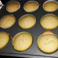 Buttery Cupcakes with Coconut Topping image