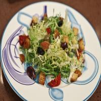 Frisée With Croutons and Spicy Olives image