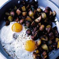Fried eggs with rosemary sautéed potatoes_image